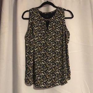 Floral tank with cutout